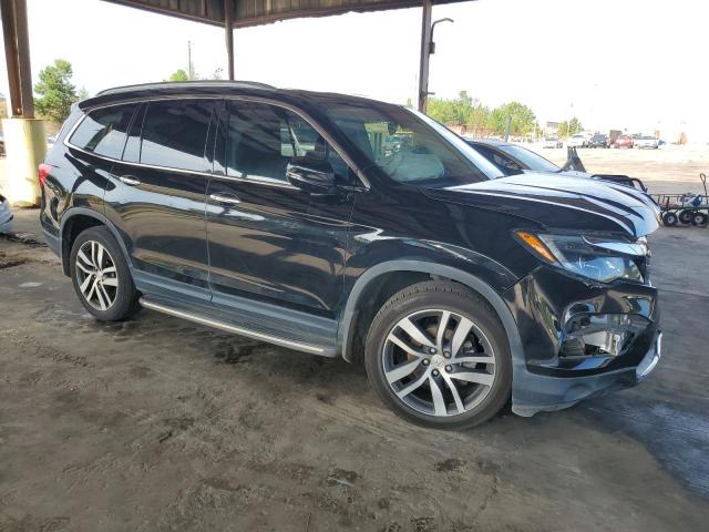 Photo 4 from auction – 2017 HONDA PILOT ELIT with VIN 5FNYF6H02HB062554