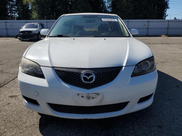 Снимка 5 от търг – 2004 MAZDA 3 I с VIN JM1BK12F341178057