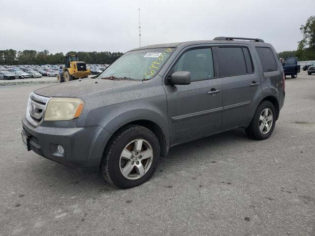 HONDA PILOT EXL 2011 with VIN 5FNYF4H65BB007340 - Photo from auction
