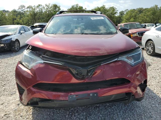 Photo 5 from auction – 2018 TOYOTA RAV4 LE with VIN 2T3ZFREV2JW450275
