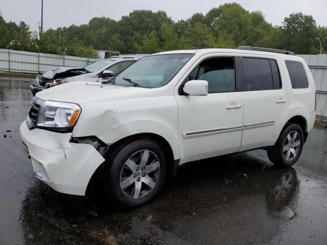 HONDA PILOT TOUR 2015 with VIN 5FNYF4H9XFB021007 - Photo from auction