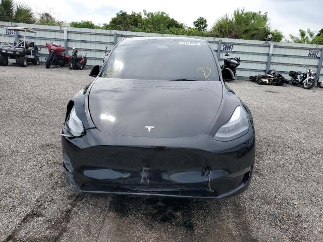 Photo 5 from auction – 2023 TESLA MODEL Y with VIN 7SAYGAEE8PF674579