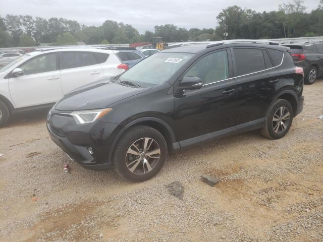 TOYOTA RAV4 XLE 2016 with VIN 2T3WFREV3GW310974 - Photo from auction