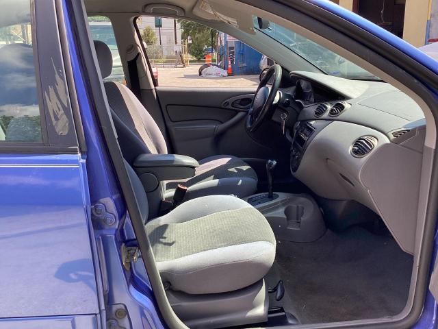 Photo 5 from auction – 2004 FORD FOCUS SE C with VIN 1FAFP343X4W156390