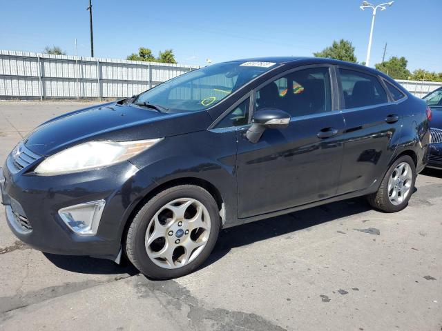 FORD FIESTA SEL 2011 with VIN 3FADP4CJXBM135386 - Photo from auction