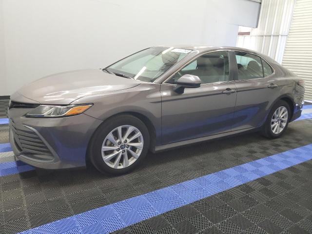 TOYOTA CAMRY LE 2022 with VIN 4T1C11AK6NU658434 - Photo from auction