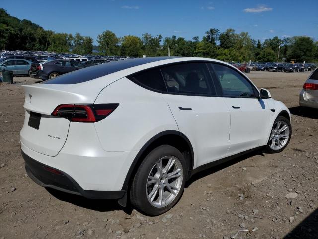 Photo 3 from auction – 2023 TESLA MODEL Y with VIN 7SAYGAEE7PF802052