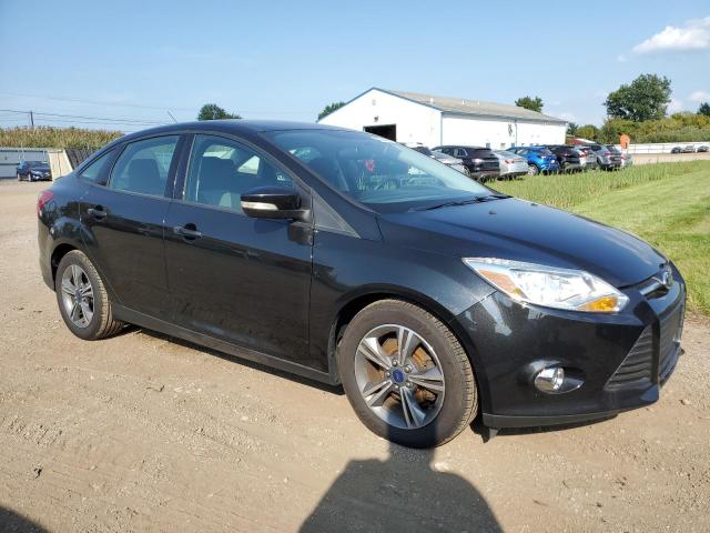 Photo 4 from auction – 2014 FORD FOCUS SE with VIN 1FADP3F20EL222945