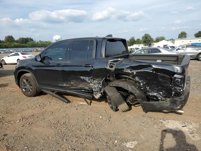 Photo 2 from auction – 2023 HONDA RIDGELINE with VIN 5FPYK3F17PB033773
