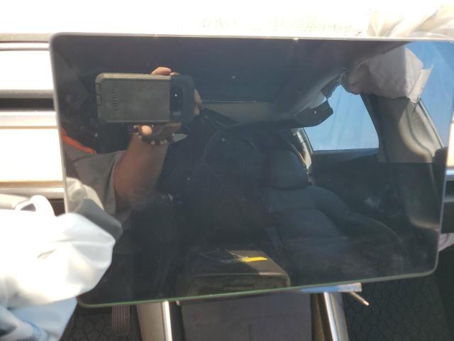 Photo 9 from auction – 2021 TESLA MODEL Y with VIN 5YJYGDED0MF106991