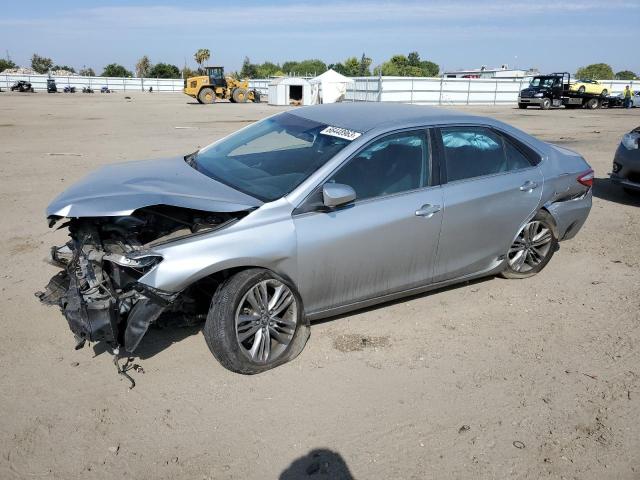 TOYOTA CAMRY LE 2016 with VIN 4T1BF1FK9GU592812 - Photo from auction