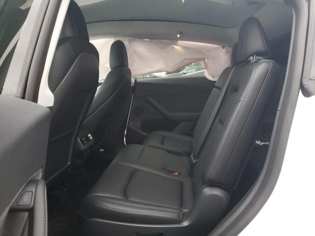 Photo 10 from auction – 2023 TESLA MODEL Y with VIN 7SAYGAEE4PF668679