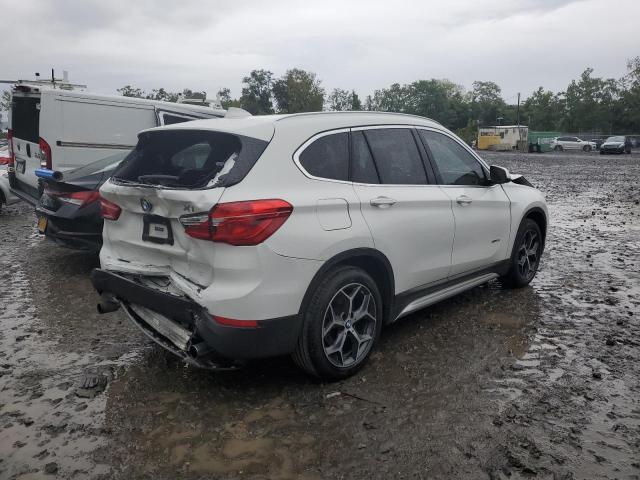 Photo 3 from auction – 2018 BMW X1 XDRIVE2 with VIN WBXHT3C30J5K27746