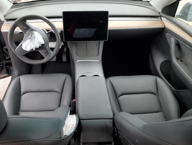 Photo 8 from auction – 2023 TESLA MODEL Y with VIN 7SAYGDEE2PA092542