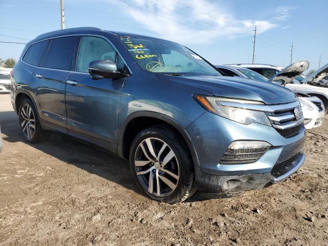 Photo 4 from auction – 2018 HONDA PILOT TOUR with VIN 5FNYF5H91JB027664