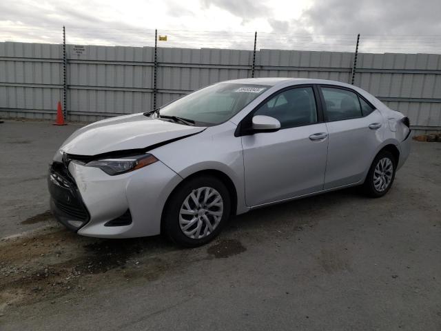TOYOTA COROLLA L 2018 with VIN 2T1BURHE8JC054493 - Photo from auction