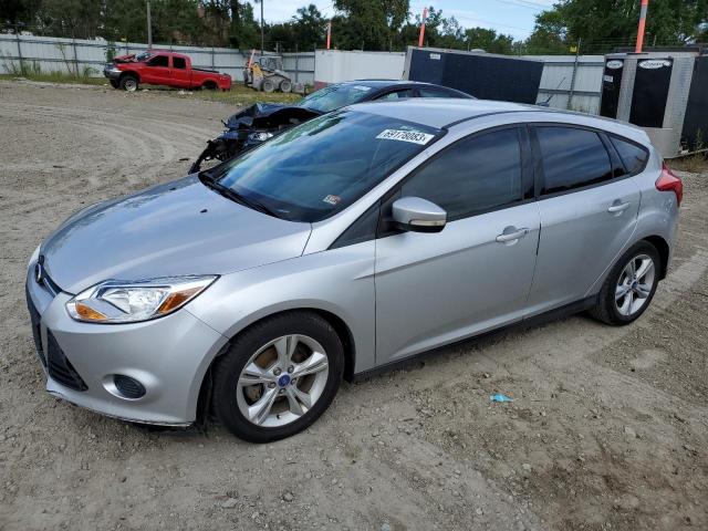 FORD FOCUS SE 2013 with VIN 1FADP3K25DL119329 - Photo from auction