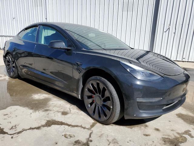 Photo 4 from auction – 2021 TESLA MODEL 3 with VIN 5YJ3E1EC4MF001604