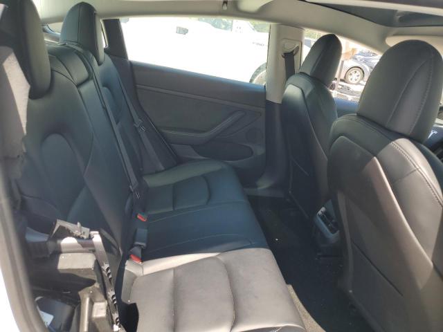Photo 10 from auction – 2021 TESLA MODEL 3 with VIN 5YJ3E1EA7MF987077