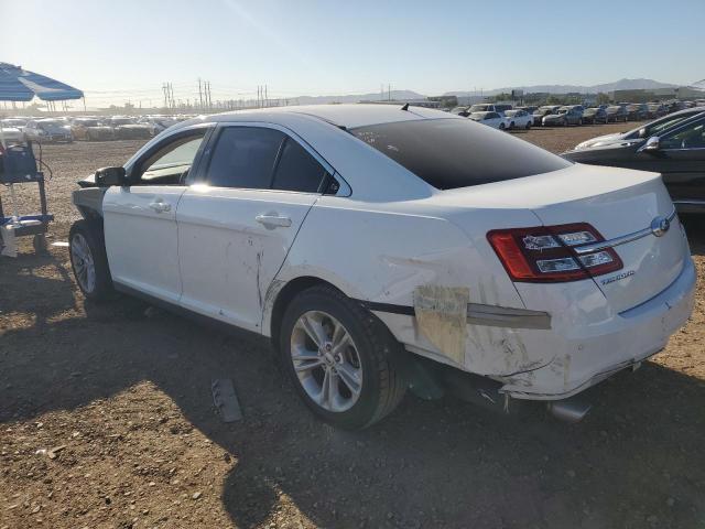 Photo 2 from auction – 2015 FORD TAURUS SEL with VIN 1FAHP2H83FG122975