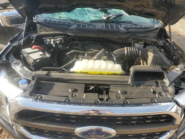 Photo 11 from auction – 2023 FORD F150 SUPER with VIN 1FTFW1E52PFA81061