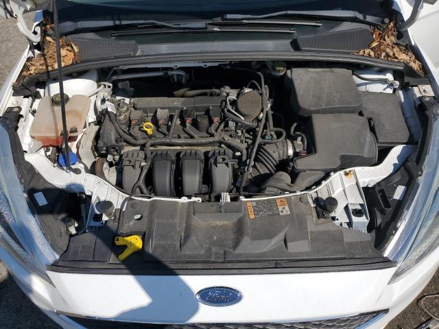 Photo 11 from auction – 2015 FORD FOCUS S with VIN 1FADP3E23FL217385