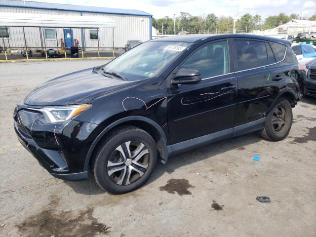 TOYOTA RAV4 LE 2018 with VIN 2T3BFREV6JW791003 - Photo from auction