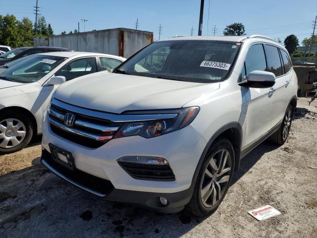 HONDA PILOT TOUR 2018 with VIN 5FNYF6H98JB070064 - Photo from auction