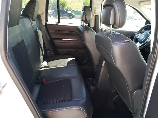 Photo 10 from auction – 2014 JEEP COMPASS LA with VIN 1C4NJDEB2ED502013