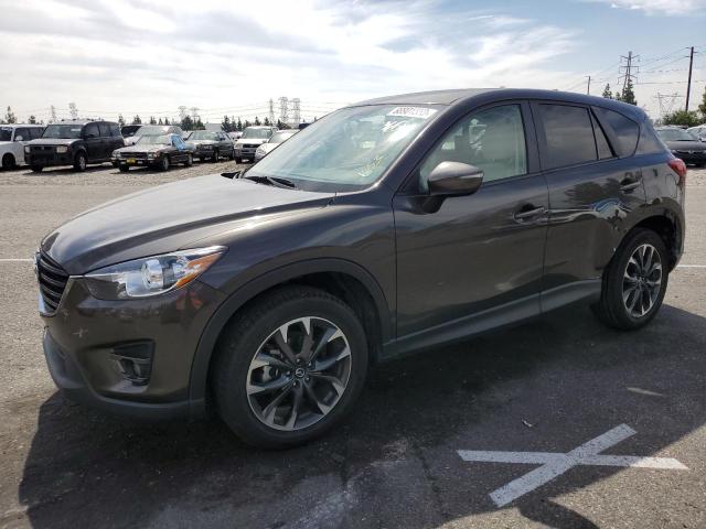 MAZDA CX-5 GT 2016 with VIN JM3KE2DYXG0775316 - Photo from auction