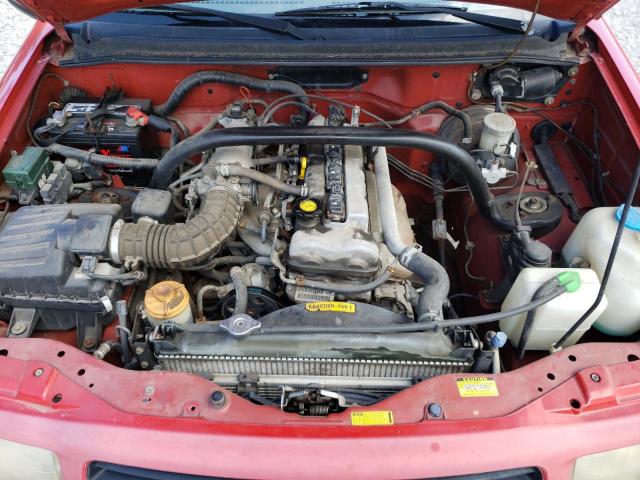 Снимка 11 от търг – 2000 CHEVROLET TRACKER с VIN 2CNBJ18C7Y6900211