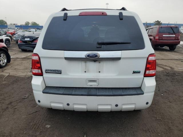 Photo 6 from auction – 2010 FORD ESCAPE LIM with VIN 1FMCU0EG3AKC76620