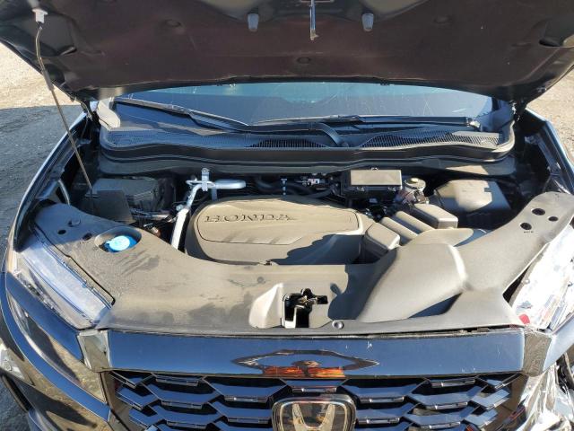 Photo 11 from auction – 2023 HONDA PASSPORT E with VIN 5FNYF8H00PB014366
