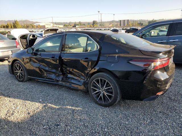 Photo 2 from auction – 2022 TOYOTA CAMRY SE with VIN 4T1G11AK2NU074887