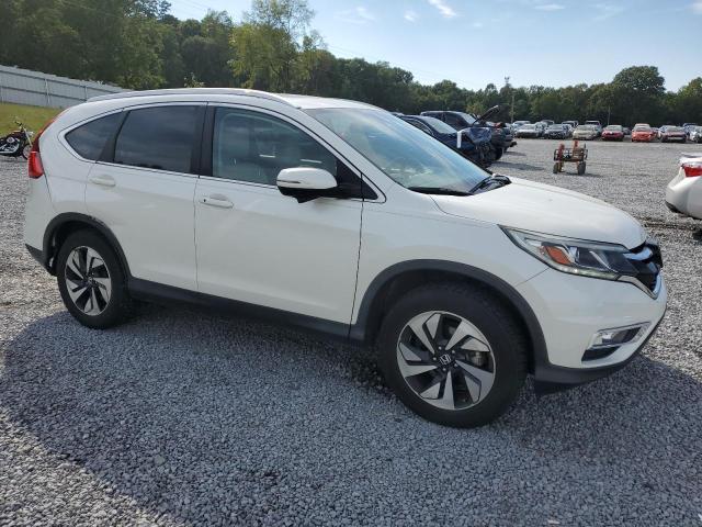 Photo 4 from auction – 2016 HONDA CR-V TOURI with VIN 5J6RM4H99GL059525