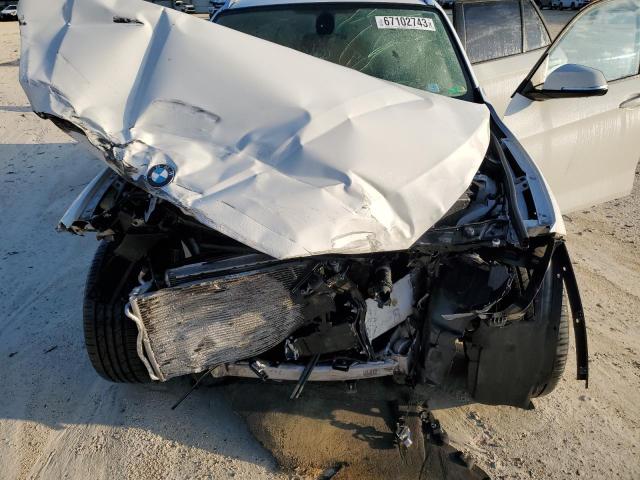 Photo 11 from auction – 2015 BMW X1 SDRIVE2 with VIN WBAVM1C57FVZ94307