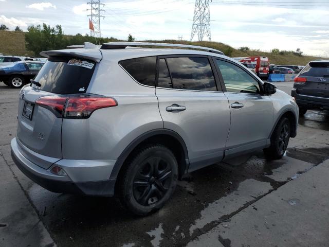 Photo 3 from auction – 2018 TOYOTA RAV4 LE with VIN JTMBFREV0JJ253671