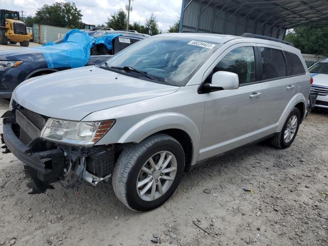 DODGE JOURNEY SX 2013 with VIN 3C4PDCBB0DT557485 - Photo from auction