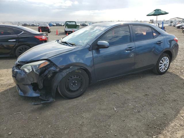 TOYOTA COROLLA L 2016 with VIN 5YFBURHE9GP394552 - Photo from auction