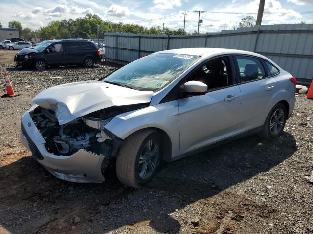 FORD FOCUS SE 2018 with VIN 1FADP3FE7JL215169 - Photo from auction