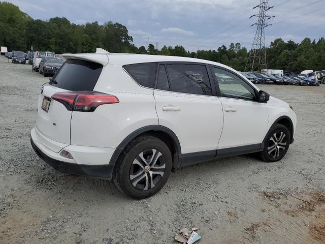Photo 3 from auction – 2018 TOYOTA RAV4 LE with VIN JTMZFREV2JJ190376