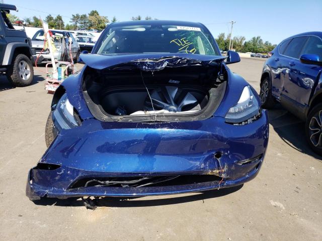 Photo 5 from auction – 2022 TESLA MODEL Y with VIN 7SAYGDEE9NF494722