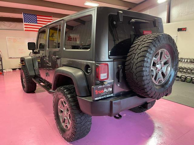 Photo 3 from auction – 2014 JEEP WRANGLER U with VIN 1C4BJWFG2EL205791
