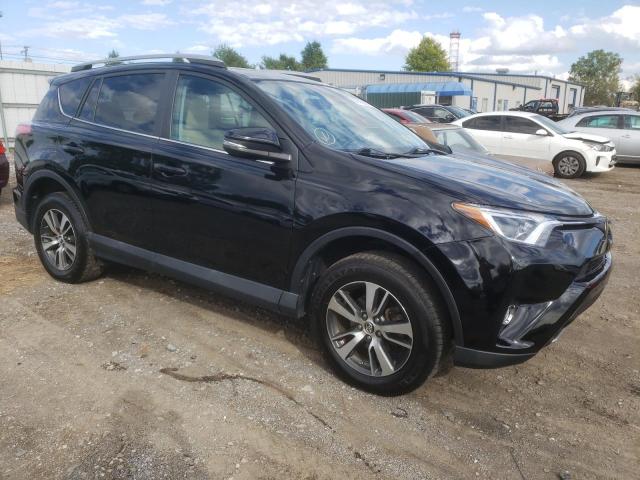 Photo 4 from auction – 2017 TOYOTA RAV4 XLE with VIN 2T3RFREV9HW555728
