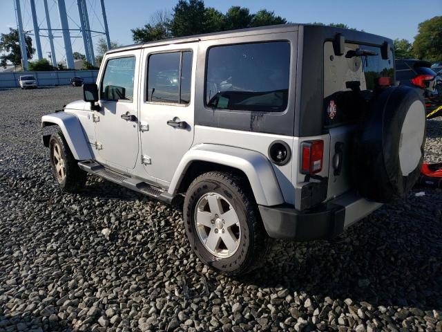Photo 2 from auction – 2011 JEEP WRANGLER U with VIN 1J4BA5H18BL633860
