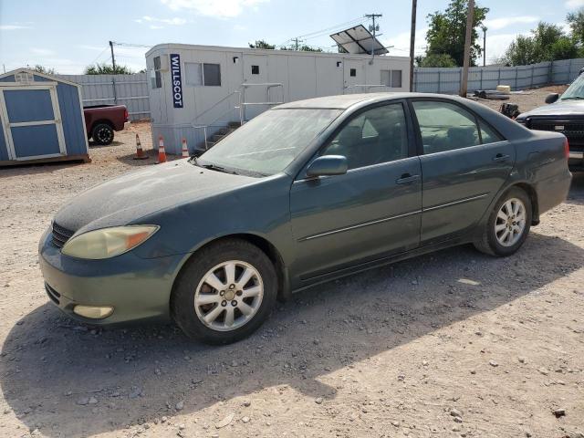 TOYOTA CAMRY LE 2003 with VIN JTDBF32K030150704 - Photo from auction
