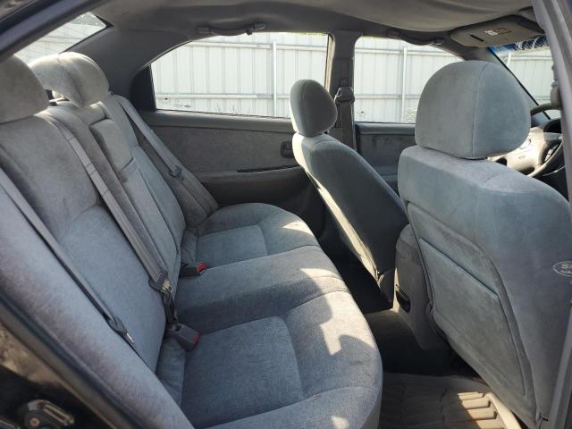 Photo 10 from auction – 2004 KIA OPTIMA LX with VIN KNAGD128945285993