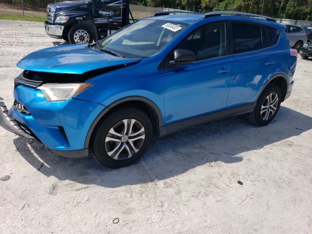 TOYOTA RAV4 LE 2017 with VIN JTMZFREV8HJ703754 - Photo from auction