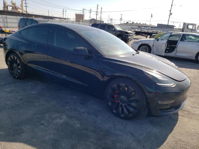 Photo 4 from auction – 2023 TESLA MODEL 3 with VIN 5YJ3E1EC8PF384743