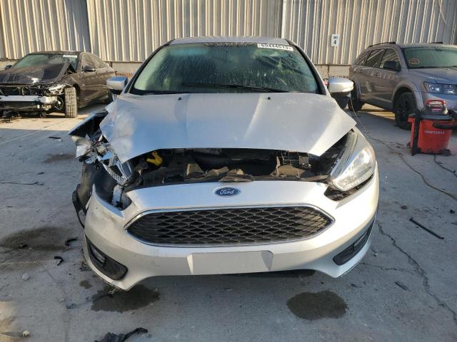 Photo 5 from auction – 2016 FORD FOCUS SE with VIN 1FADP3K22GL399750